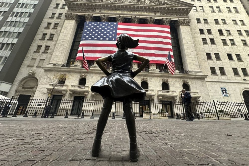 FILE - The Fearless Girl statue stands in front of the New York Stock Exchange in New York's Financial District on Tuesday, Nov. 5, 2024. (AP Photo/Peter Morgan, File)