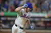 New York Mets' Pete Alonso celebrates as he runs the bases after hitting a home run during the sixth inning of a baseball game against the Atlanta Braves Tuesday, Aug. 12, 2025, in New York. (AP Photo/Frank Franklin II)