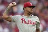 Philadelphia Phillies pitcher Taijuan Walker throws during the fifth inning of a baseball game against the Cincinnati Reds Monday, Aug. 11, 2025, in Cincinnati. (AP Photo/Carolyn Kaster)