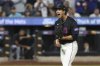 New York Mets pitcher Jonah Tong reacts after striking out Miami Marlins' Liam Hicks during the fifth inning of a baseball game Friday, Aug. 29, 2025, in New York. (AP Photo/Pamela Smith)