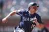 Seattle Mariners' Cal Raleigh rounds third base before scoring in the third inning of a baseball game against the Atlanta Braves, Sunday, Sept. 7, 2025, in Atlanta. (AP Photo/Colin Hubbard)