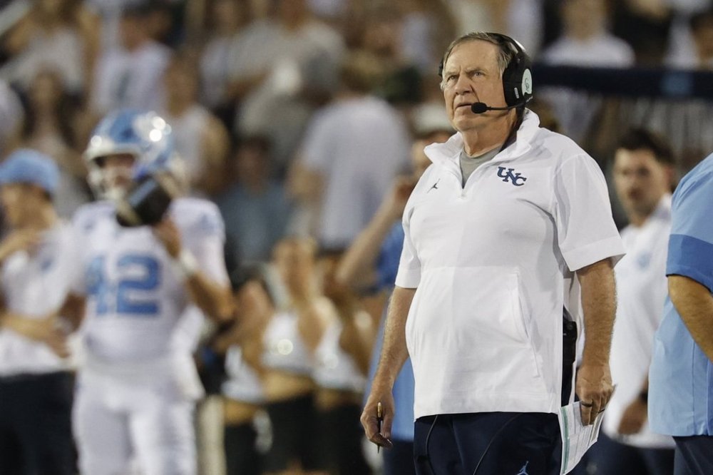 North Carolina head coach Bill Belichick watches from the sidelines during the first half of an NCAA football game against Charlotte in Charlotte, N.C., Saturday, Sept. 6, 2025. (AP Photo/Nell Redmond)