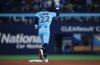 Blue Jays third baseman Ernie Clement celebrates his three-run homer against the Chicago Cubs during the fourth inning of a Major League Baseball game in Toronto on Tuesday, Aug. 12, 2025. THE CANADIAN PRESS/Nathan Denette
