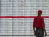 Cancelled and delayed Air Canada flights are seen on the departure board at Montreal-Pierre Elliott Trudeau International Airport in Dorval, Que., Friday, Aug. 15, 2025. THE CANADIAN PRESS/Christinne Muschi