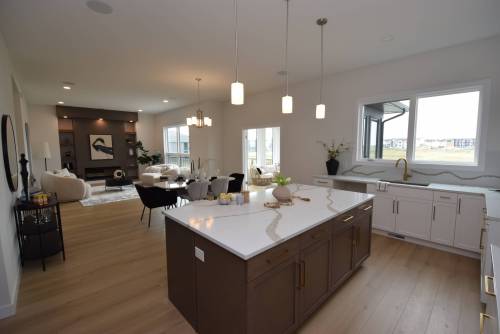 TODD LEWYS / FREE PRESS
                                Natural light, plenty of space and luxurious finishings give the main living area at 55 Siddiqui Ridge, Bison Run, a warm and inviting ambience.