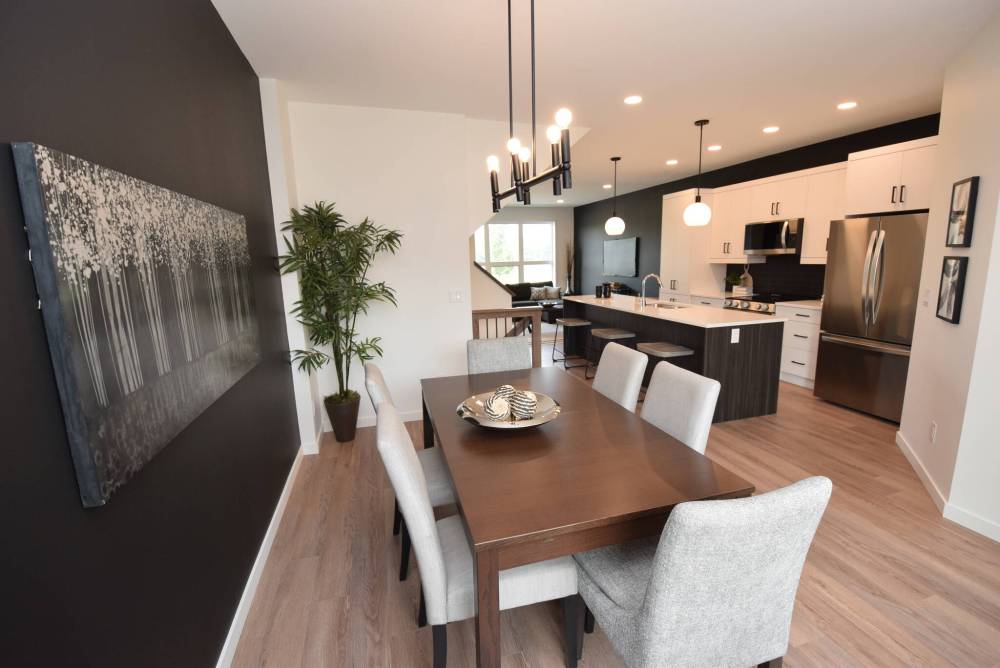 TODD LEWYS / FREE PRESS
A well-defined and elegant dining room awaits next to the pristine kitchen.