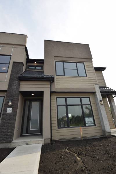 TODD LEWYS / FREE PRESS
                                This creatively crafted condo is stately, both inside and out.
