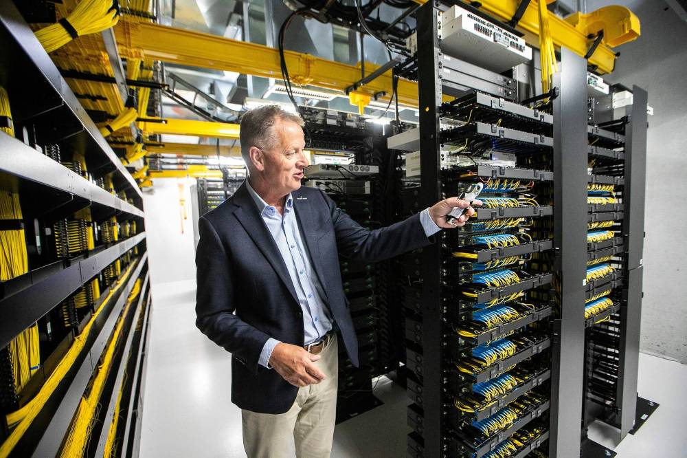 ‘We’re going to expand well past the points that we’re at now,’ says Conley Kehler, co-founding partner and executive director of strategic partnerships at Valley Fiber Ltd., in the company’s server room in Winkler. (Mikaela MacKenzie / Free Press)