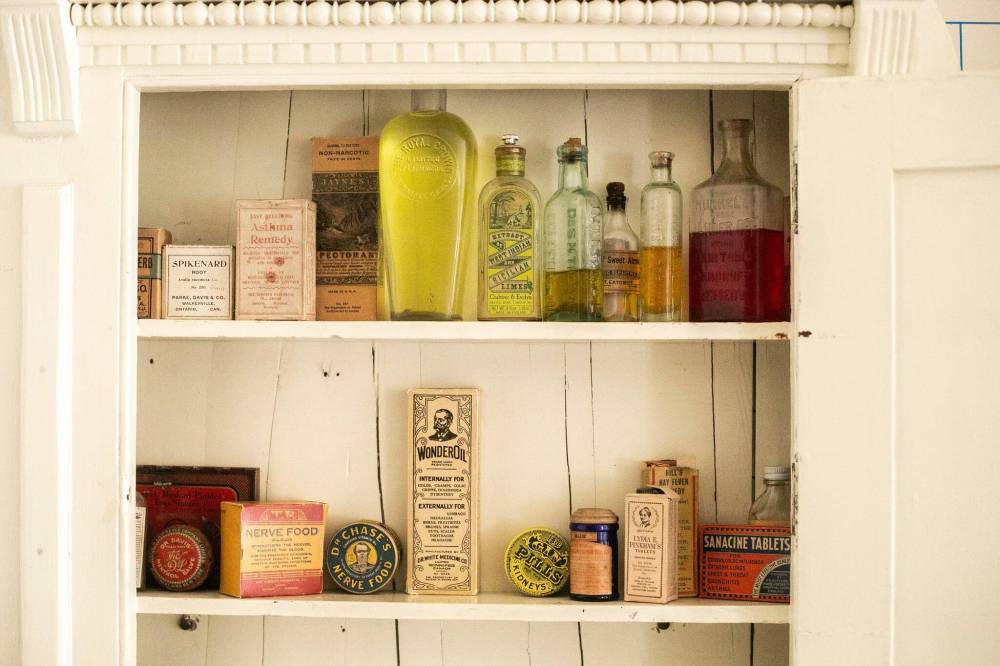 MIKAELA MACKENZIE / FREE PRESS
The medicine cabinet in the Macdonald bathroom holds a collection of exotic remedies.