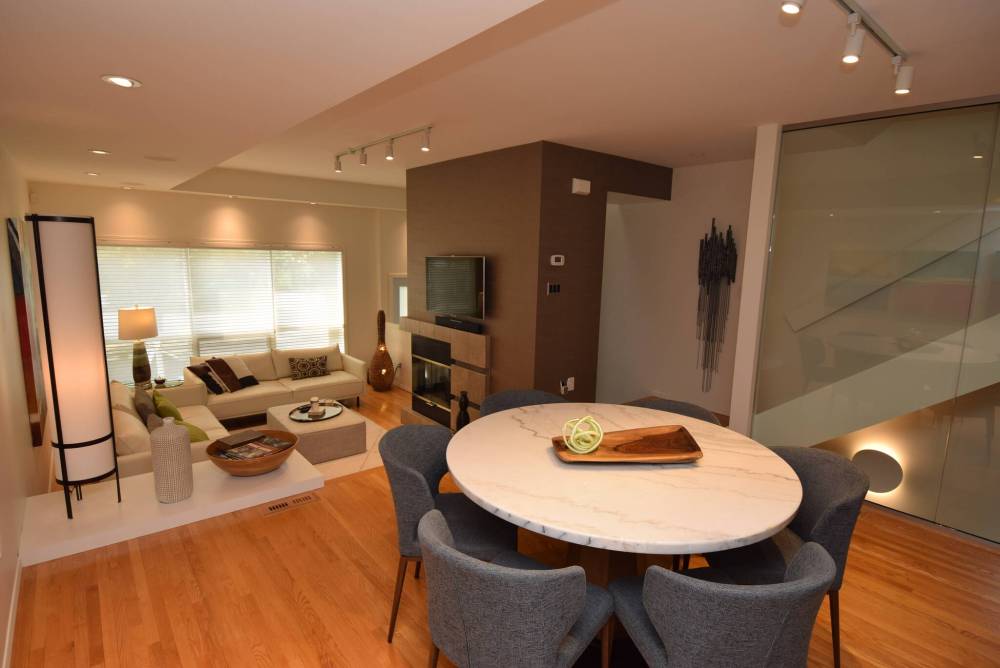 The formal dining area flows seamlessly into the living room.