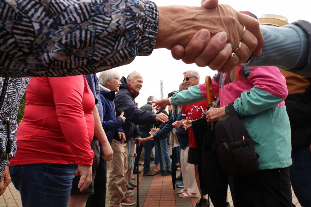Between 300 to 400 people participated in the Handshake Across the Border event on Saturday at the International Peace Garden along Manitoba’s border with North Dakota. (Tim Smith/The Brandon Sun)