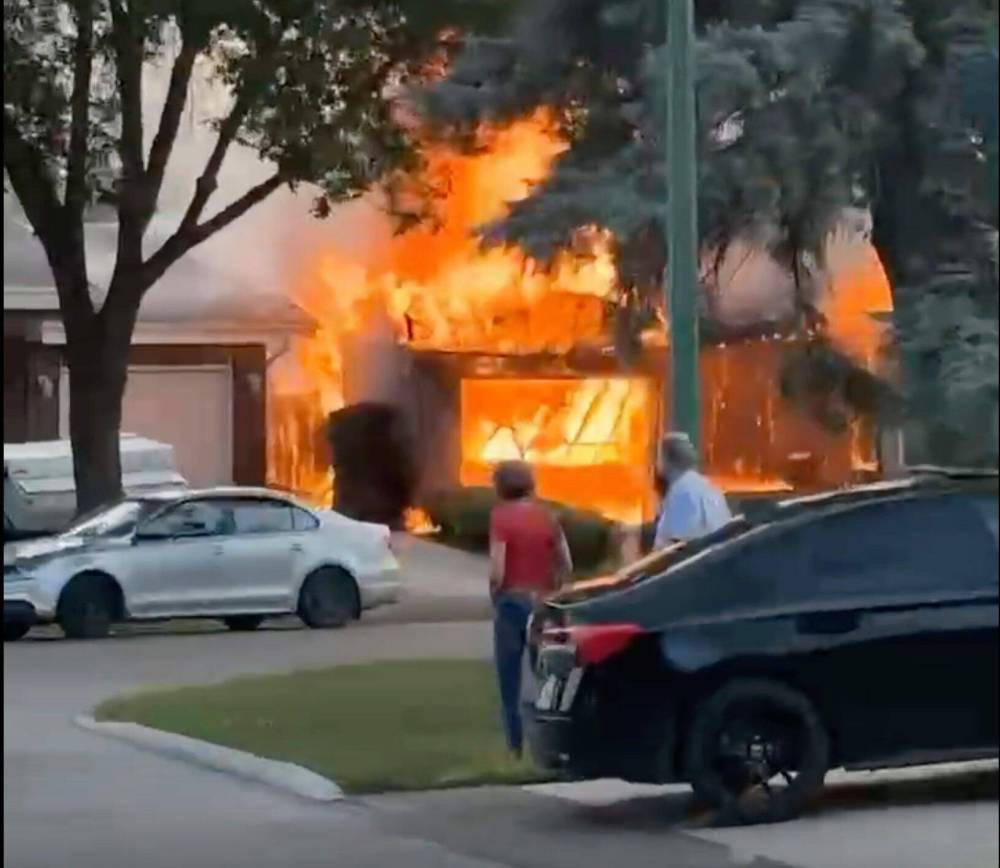 Stephanie Kulczycki photo
Crews were called to Southwalk Bay around 7:40 p.m. Sunday, but by the time they arrived, the fire was already out of control and had spread to a neighbouring house.