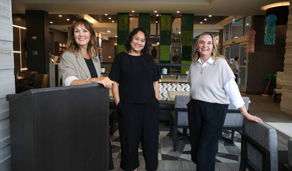 From left: Tracey Maconachie, Kristine Tubiera and Linda Drosdowech, co-founders of Keynote Connect, at Hyatt House Winnipeg-South/Outlet Collection, where their launch event will take place on Wednesday. (Ruth Bonneville / Free Press)