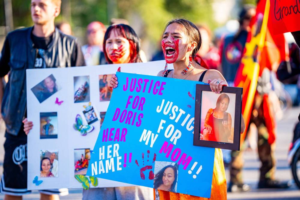 NIC ADAM / FREE PRESS FILES
Britney Porter, a daughter of Doris Porter, yells “Justice for my mom” and “We want answers” at the Harry Lazarenko Bridge at a protest held after her mother was struck and killed on August 10, 2024.