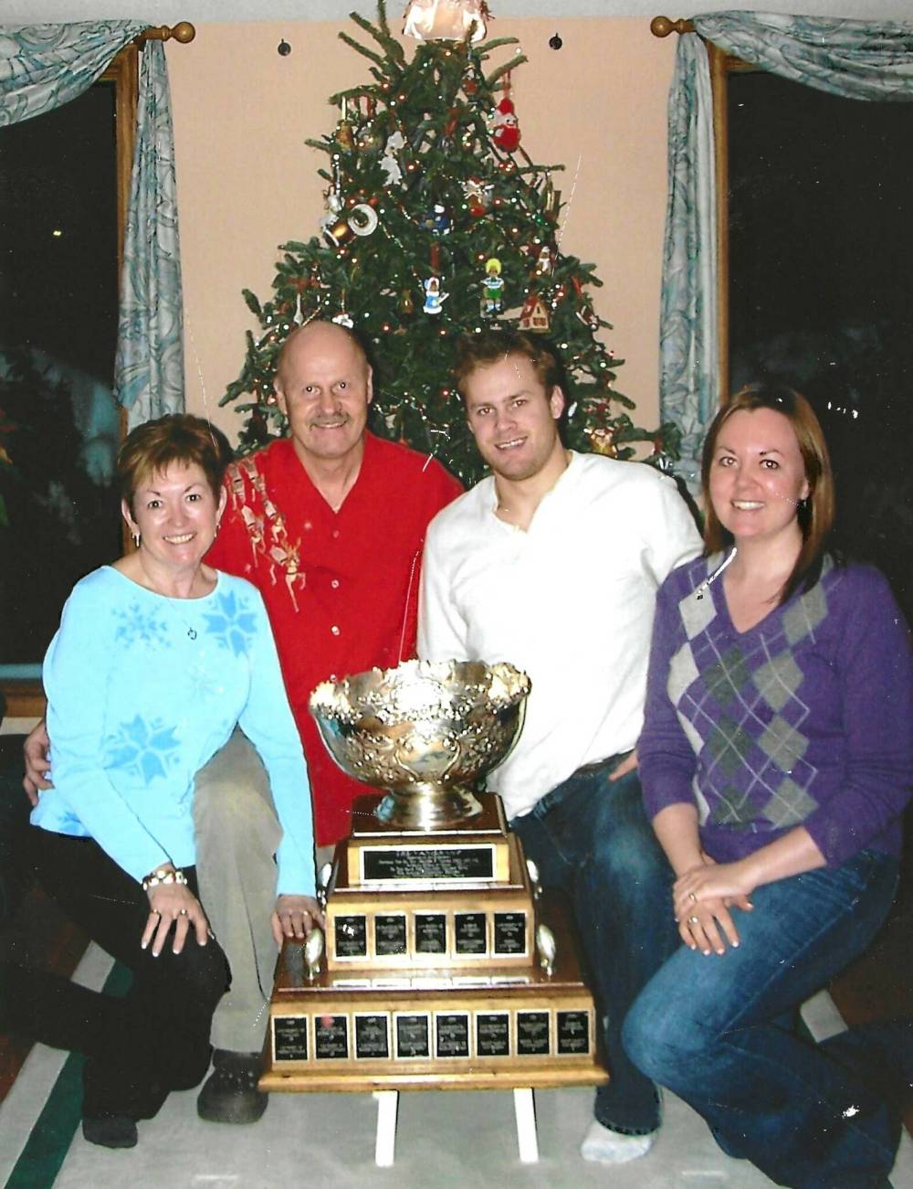 SUPPLIED
Ron Gustafson’s family with the Vanier Cup.
