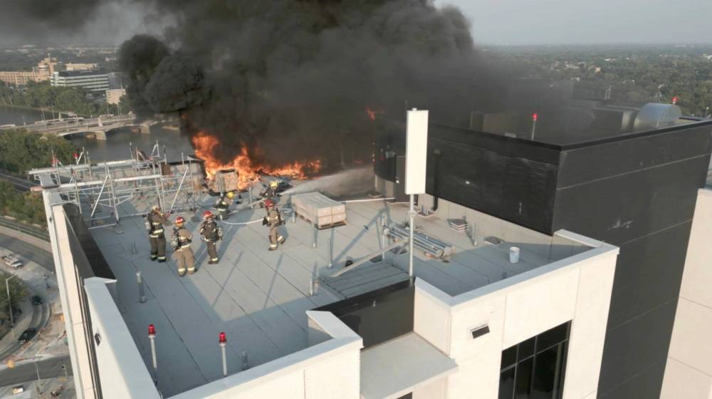 TAMEEM SAFI PHOTO
Fire crews lugged equipment to the roof because the elevators weren’t operating.