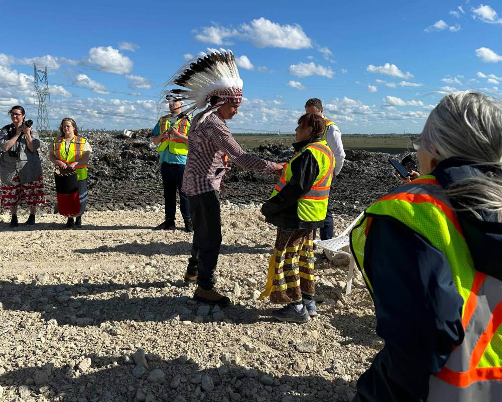 Supplied
Donna Bartlett, grandmother of slaying victim Marcedes Myran, at Prairie Green Landfill with premier Wab Kinew during a ceremony in June, 2024.
