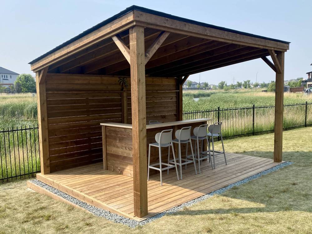 Marc LaBossiere photos / Free Press
This covered ground-level deck boasts a custom two-tiered bar.