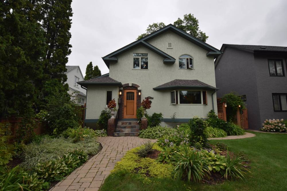 Todd Lewys photos / Free Press
                                The stately two-storey at 322 Queenston St. grabs your attention the minute you see it.