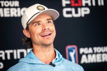 MIKAELA MACKENZIE / FREE PRESS FILES
                                Manitoba Open sponsor exemption Eric Comrie speaks to the media at Breezy Bend Country Club on Tuesday, Aug. 19, 2025.