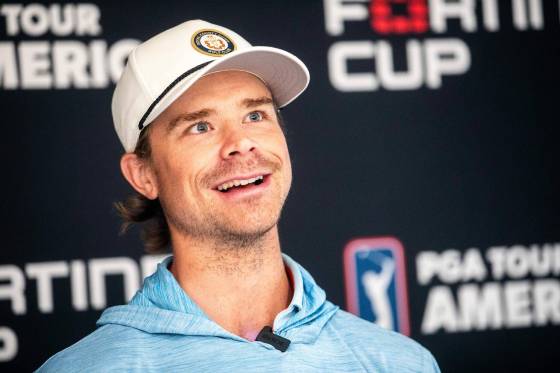 Eric Comrie had a blast watching the pros deftly handle the golf course. (Mikaela