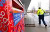 A Canada Post worker arrives for work in Montreal on Tuesday, Dec.17, 2024. Canada Post is resuming operations after a month-long strike by more than 55,000 postal workers left letters and parcels in limbo.THE CANADIAN PRESS/Christinne Muschi