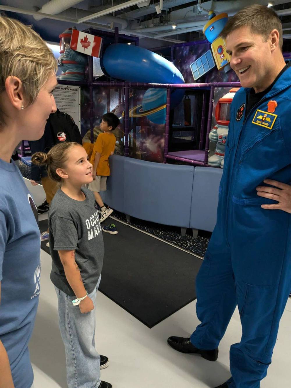 Sara Gerullis and her daughter, Liesl, a nine-year-old space enthusiast, met astronaut Jeremy Hansen when he visited Winnipeg last year.