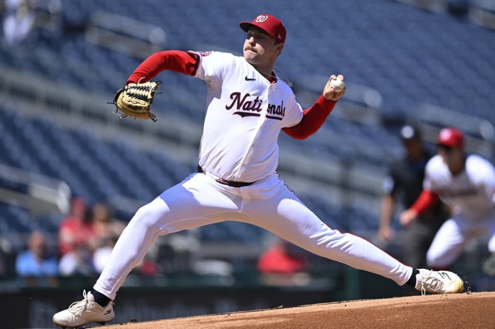 Washington Nationals starting pitcher Mitchell Parker throws during the first inning of a baseball game against the Miami Marlins, Wednesday, Sept. 3, 2025, in Washington. (AP Photo/John McDonnell)