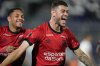 FILE - Romûlo of Brazil's Athletico Paranaense, right, celebrates scoring his side's opening goal against Paraguay's Libertad during a Copa Libertadores Group G soccer match at Defensores del Chaco stadium in Asuncion, Paraguay, Thursday, May 4, 2023. (AP Photo/Jorge Saenz, file)