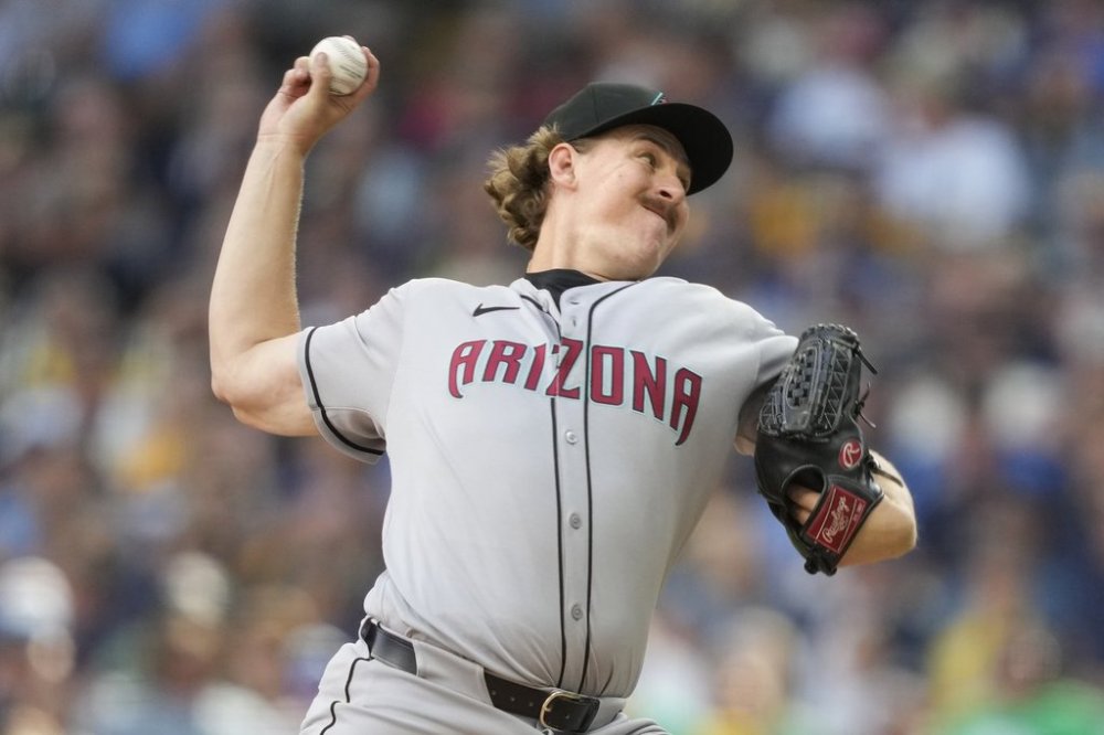 Arizona Diamondbacks pitcher Taylor Rashi throws during the eighth inning of his major league debut in a baseball game against the Milwaukee Brewers, Thursday, Aug. 28, 2025, in Milwaukee. (AP Photo/Kayla Wolf)
