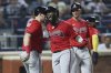 Atlanta Braves' Michael Harris II, center, celebrates his grand slam during the fourth inning of a baseball game against the New York Mets, Wednesday, Aug. 13, 2025, in New York. (AP Photo/Heather Khalifa)