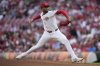 Cincinnati Reds pitcher Hunter Greene throws during the first inning of a baseball game against the Philadelphia Phillies Wednesday, Aug. 13, 2025, in Cincinnati. (AP Photo/Carolyn Kaster)