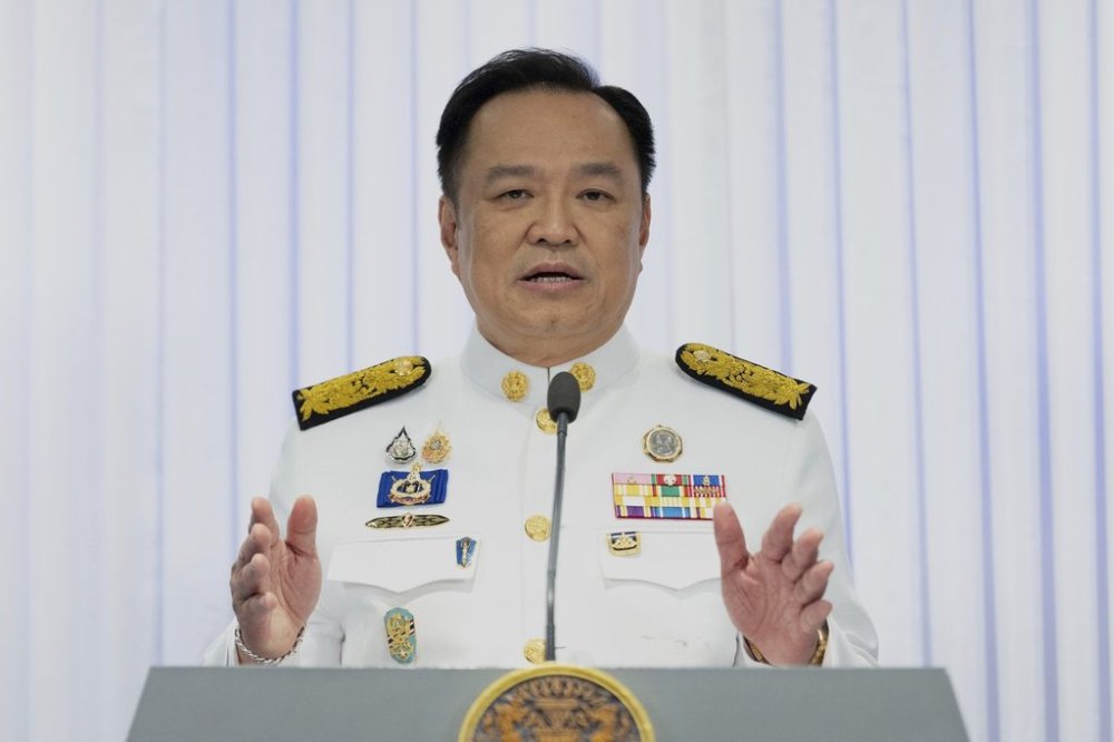 Thailand's new Prime Minister Anutin Charnvirakul talks to media members after receiving a royal letter of endorsement for the post at Bhumjai Thai party headquarters in Bangkok, Thailand, Sunday, Sept. 7, 2025. (AP Photo/Arnun Chonmahatrakool)