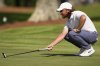Tommy Fleetwood, of England, lines up a putt on the 16th green during the final round of the St. Jude Championship golf tournament Sunday, Aug. 10, 2025, in Memphis, Tenn. (AP Photo/George Walker IV)