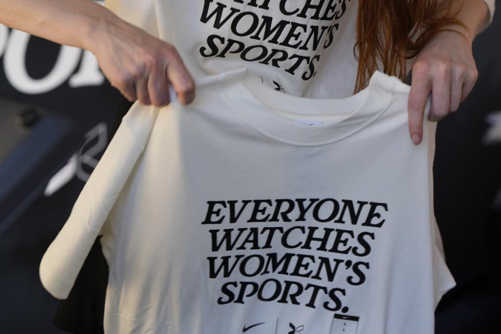 FILE - T-shirts with the words