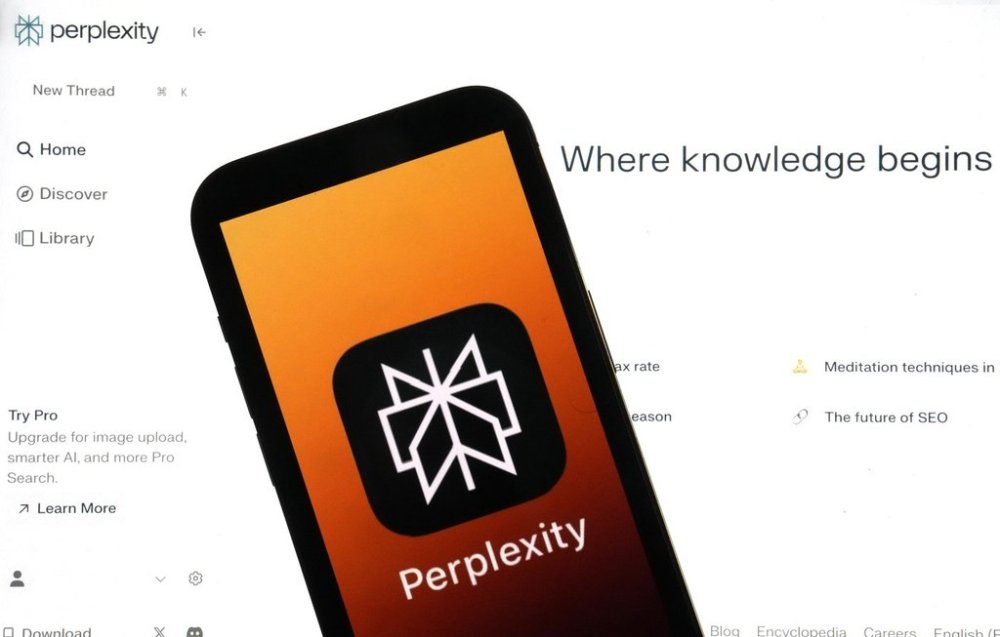 Bell Canada is partnering with Perplexity, an AI-powered conversational search engine, to give its customers a year of free artificial intelligence services. The Perplexity website and logo are shown in this photo, in New York, Friday, July 5, 2024. (AP Photo/Richard Drew)