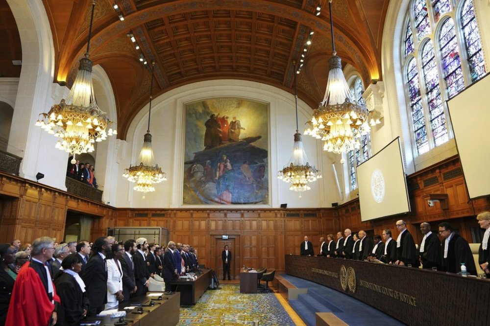 FILE - Judges, right, arrive to the International Court of Justice on July 23, 2025, in The Hague, Netherlands. (AP Photo/Peter Dejong, File)