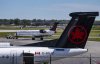 An Air Canada plane gets a pushback from its gate at Montreal-Pierre Elliott Trudeau International Airport in Dorval, Que., on Tuesday,  Aug. 19, 2025. THE CANADIAN PRESS/Christinne Muschi