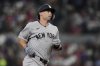 New York Yankees' Paul Goldschmidt rounds the bases after hitting a solo home run in the seventh inning of a baseball game against the Texas Rangers Wednesday, Aug. 6, 2025, in Arlington, Texas. (AP Photo/Tony Gutierrez)