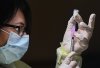 Francesca Paceri, a registered pharmacist technician carefully fills the Pfizer-BioNTech COVID-19 mRNA vaccine at a vaccine clinic during the COVID-19 pandemic in Toronto on Tuesday, December 15, 2020. THE CANADIAN PRESS/Nathan Denette