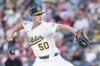 Athletics pitcher Jack Perkins throws to the Los Angeles Angels during the second inning of a baseball game Friday, Aug. 15, 2025, in West Sacramento, Calif. (AP Photo/Sara Nevis)