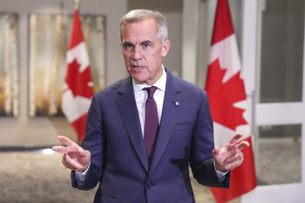 Prime Minister Mark Carney speaks to the media, at the Liberal Cabinet Retreat, in Toronto, Wednesday, Sept. 3, 2025. THE CANADIAN PRESS/Chris Young