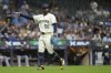 Milwaukee Brewers' Grant Anderson gestures as he walks to the dugout during the seventh inning of a baseball game against the Pittsburgh Pirates, Monday, Aug. 11, 2025, in Milwaukee. (AP Photo/Aaron Gash)