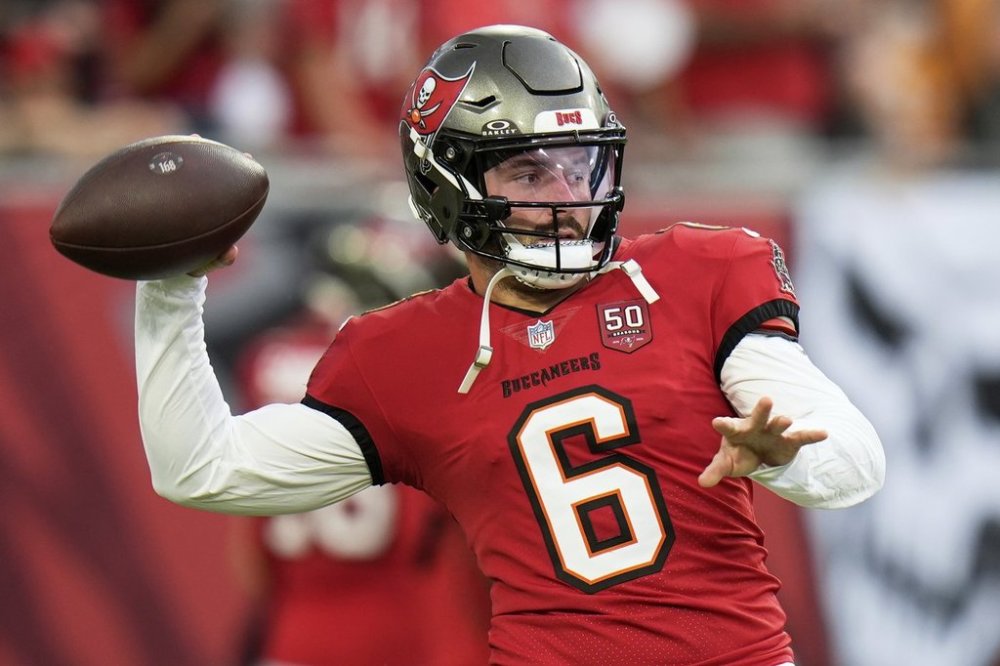 Tampa Bay Buccaneers quarterback Baker Mayfield warms up before an NFL preseason football game against the Tennessee Titans on Saturday, Aug. 9, 2025, in Tampa, Fla. (AP Photo/Chris O'Meara)