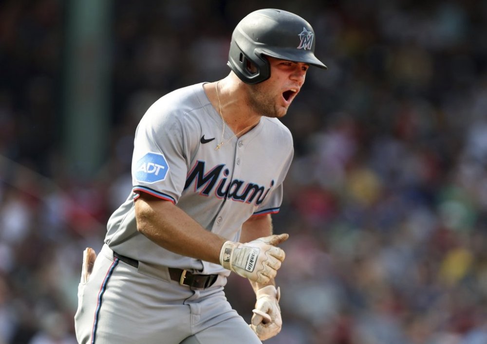 Miami Marlins' Jakob Marsee reacts after hitting a two-run home run in the ninth inning of a baseball game against the Boston Red Sox, Sunday, Aug. 17, 2025, in Boston. (AP Photo/Jim Davis)