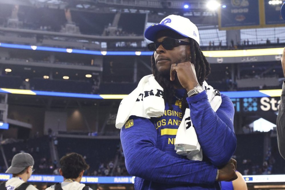 Los Angeles Rams wide receiver Davante Adams stands on the field after an NFL preseason football game against the Los Angeles Chargers, Saturday, Aug. 16, 2025, in Inglewood, Calif. (AP Photo/Jessie Alcheh)
