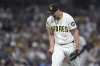 San Diego Padres starting pitcher Nick Pivetta reacts after a strikeout to end the top of the sixth inning of a baseball game against the San Francisco Giants Tuesday, Aug. 19, 2025, in San Diego. (AP Photo/Orlando Ramirez)