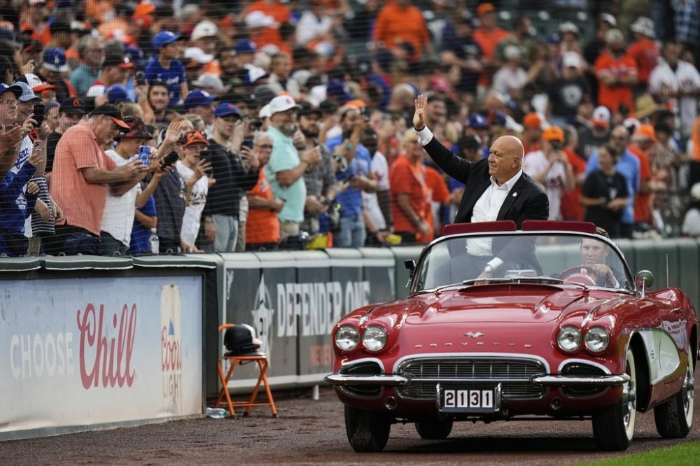 Former Baltimore Oriole Cal Ripken Jr. is honored during a ceremony commemorating the 30-year anniversary of setting the record for most consecutive games played in the MLB, before a baseball game between the Orioles and the Los Angeles Dodgers, Saturday, Sept. 6, 2025, in Baltimore. (AP Photo/Stephanie Scarbrough)