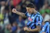 Atalanta's Gianluca Scamacca celebrates after scoring during the Italian Serie A soccer match between Atalanta and Pisa at Gewiss Stadium in Bergamo, Italy, Sunday, Aug. 24, 2025. (Spada/LaPresse via AP)