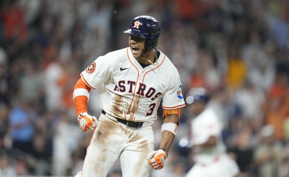 Houston Astros' Jeremy Peña (3) reacts after his RBI single against New York Yankees relief pitcher Camilo Doval during the eighth inning of a baseball game Wednesday, Sept. 3, 2025, in Houston. (AP Photo/Karen Warren)